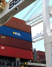a cotainer in a stack pictured from an angle with the ESL logo