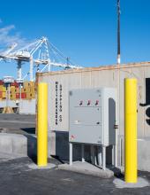 One of the newly installed refrigerated container plugs (reefer plugs) is seen at Terminal 5 in Seattle. The addition of the new plugs brings the total to over 1,500 at the terminal. Reefer plugs provide electrical power to refrigerated containers, maintaining optimal temperatures for perishable cargo while containers await vessel loading or inland transportation.